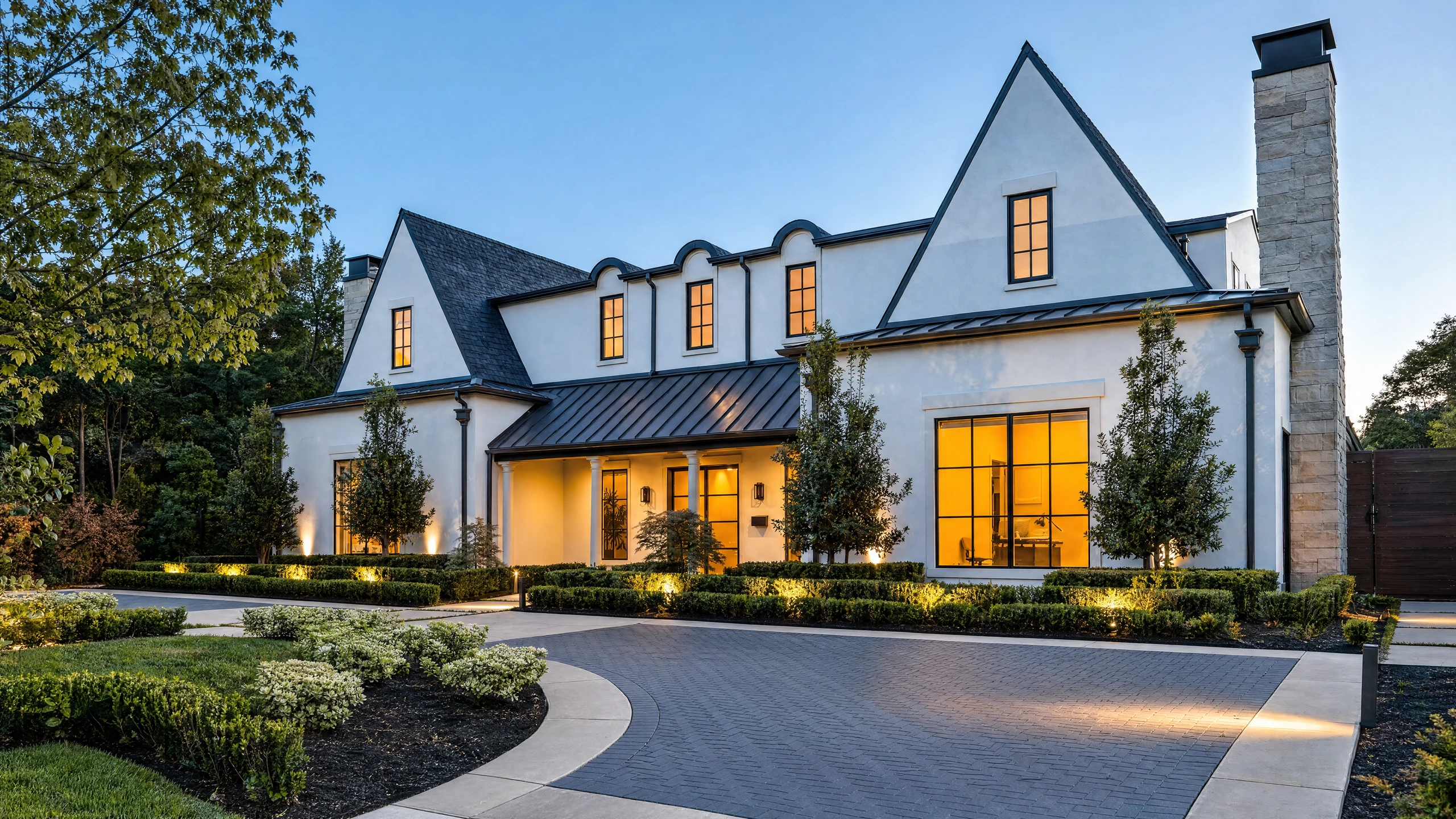 Luxury custom home at dusk in Dallas